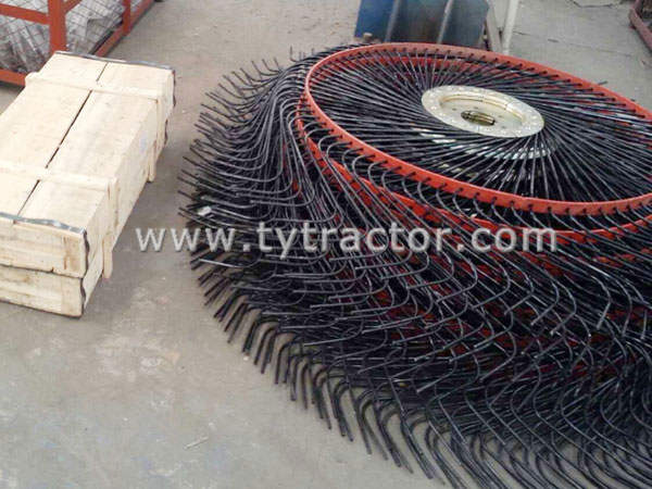 Rotary finger wheel lawn mower hay rake